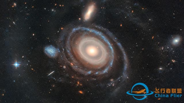 哈勃捕捉到“宇宙靶心”圖像：揭示令人驚嘆的九環(huán)星系-2456